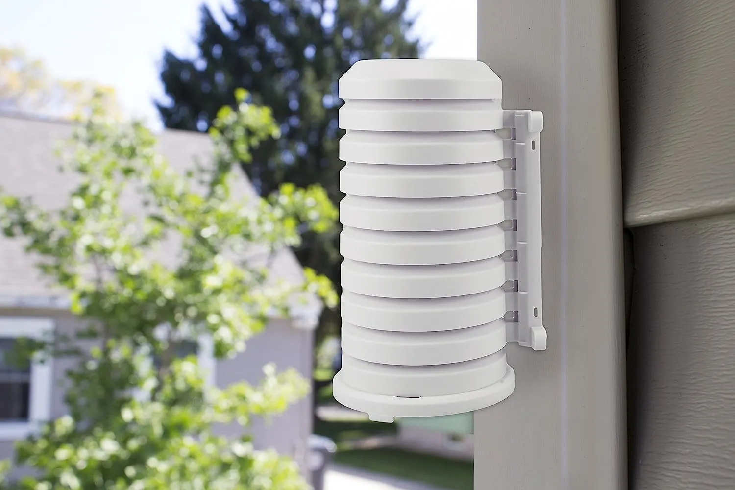 La Crosse Technology 925-1418 Sensor Shield protecting outdoor sensors from rain and snow."